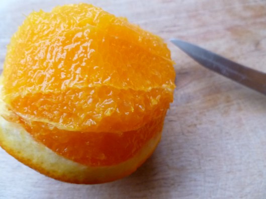Removing peel and slicing and removing orange segments 001
