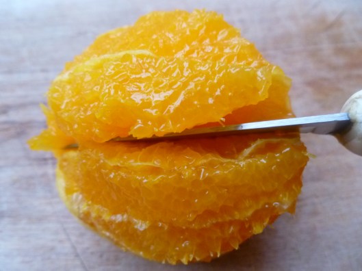 Removing peel and slicing and removing orange segments 003