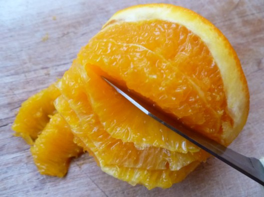 Removing peel and slicing and removing orange segments 005